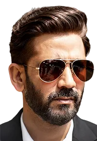 Rohan Bera, wearing a wavy side-swept hair system
